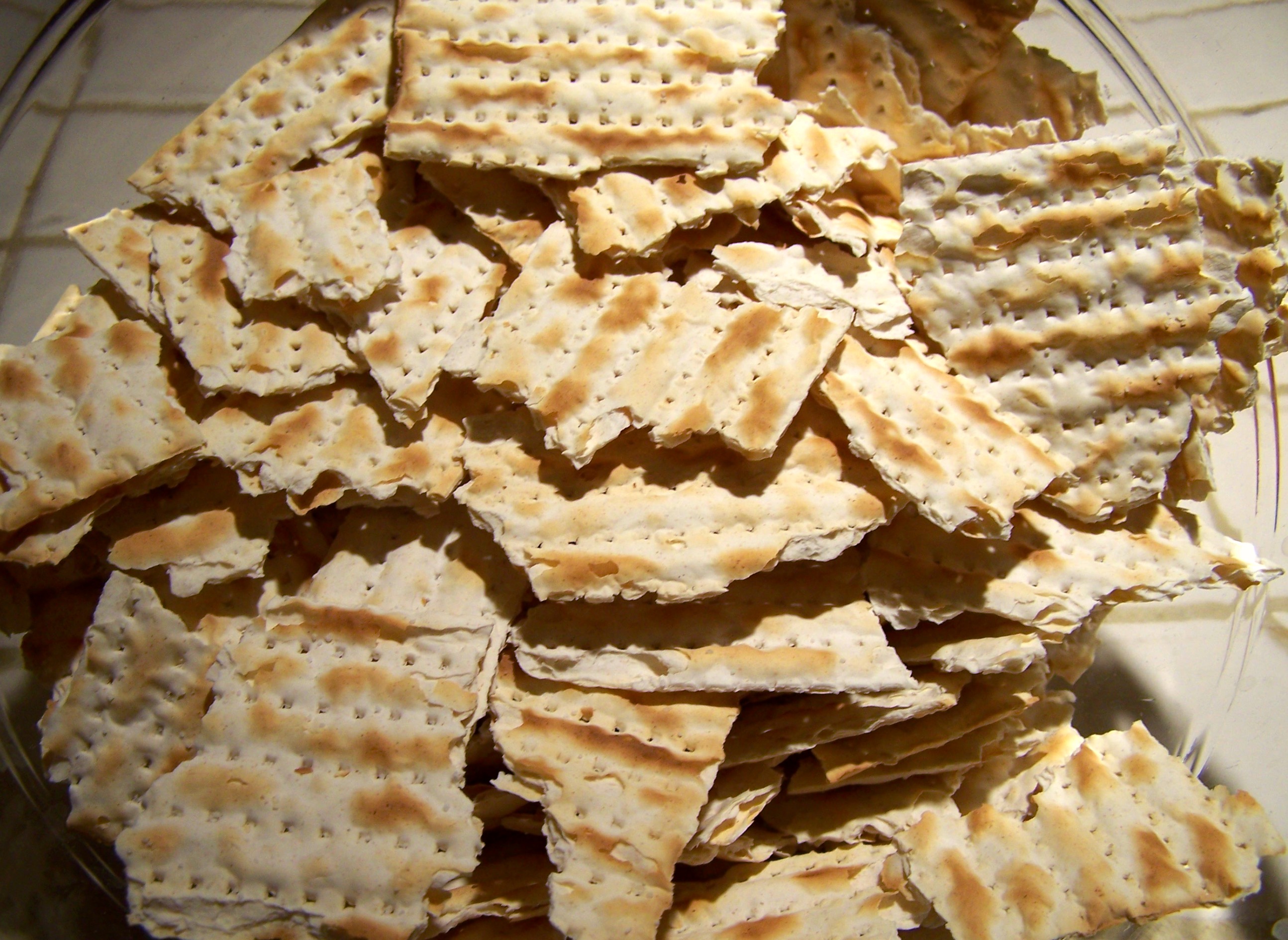 Since the Exodus from Egypt the people of Israel have been developing creative ways to eat matzah, but all of them involve breaking the unleavened bread.  (Photo from "Matzo Stuffing: A Jewish Twist on Thanksgiving", LeahsThoughts.com)